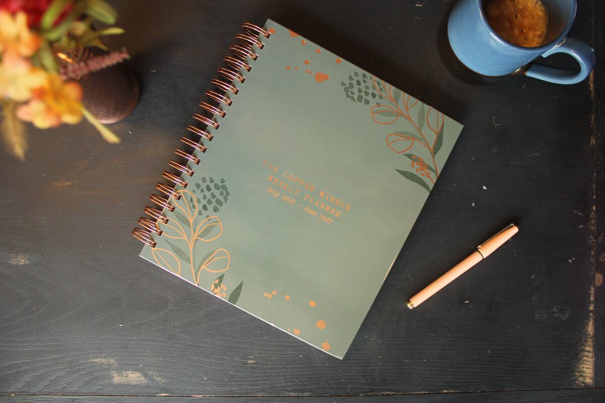 Olive cover styled on a dark table