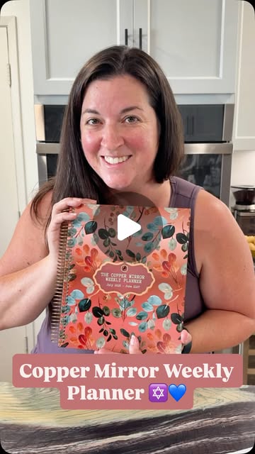 Jennifer holding The Copper Mirror Weekly Planner in her Instagram review